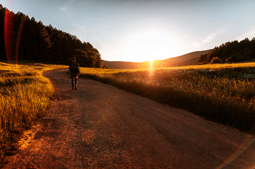 Young man walking through nowhere