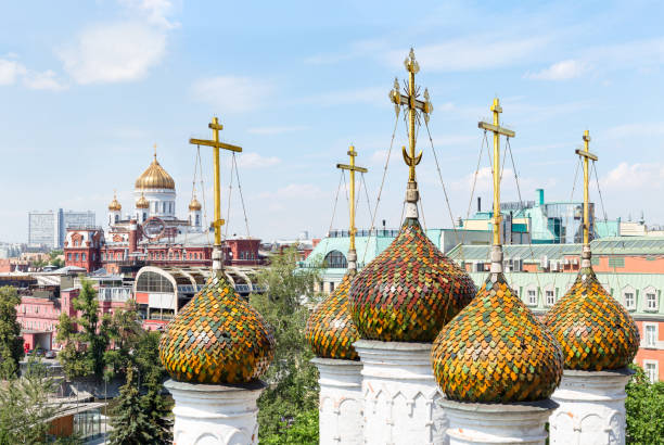 High angle view of Moscow downtown - domes of an Orthodox church of Saint Nicholas at the foregrounds, old confectionery, athedral of Christ the Saviour, office and residential buildings stock photo