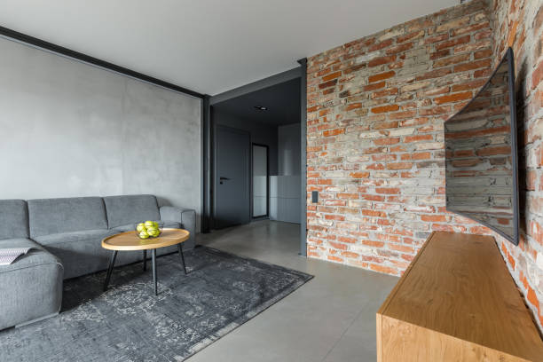 istock Living room with brick wall 701024840