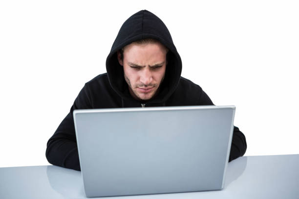 istock Handsome man in black hoodie using laptop 701038658