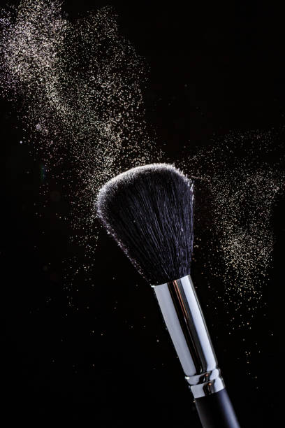 istock Brush and cloud powder on a black 701044420
