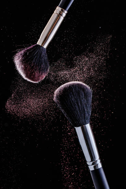istock Brush and cloud powder on a black 701044426