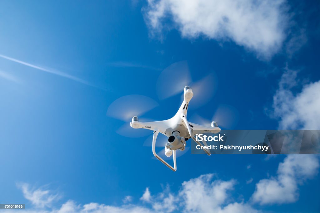 Drone fly in the blue sky Drone Stock Photo