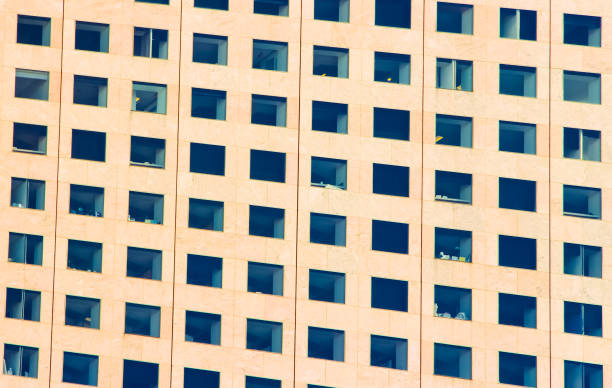 istock Countless Uniform Windows of an Office Building 701050592