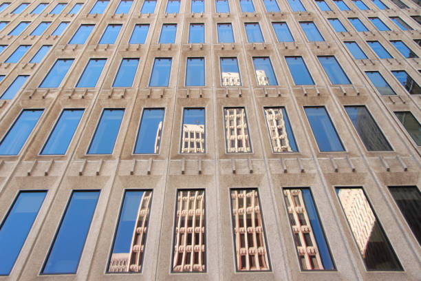 istock Reflection of a Skyscraper In The Windows Of Another Building 701050666