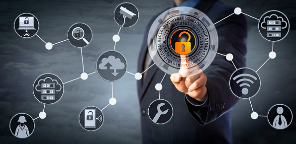 Blue chip manager is unlocking a virtual locking mechanism to access shared cloud resources. Internet concept for identity & access management, cloud storage, cybersecurity and managed services.