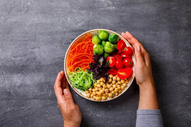 istock Raw mixed Vegetables and chickpeas.Vegetarian Buddha Bowl 701065600