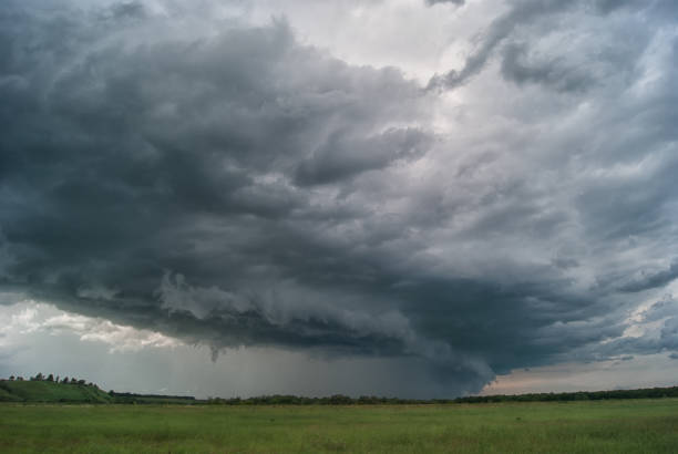 istock Storm cyclone over summer fields hills and forests 701066136