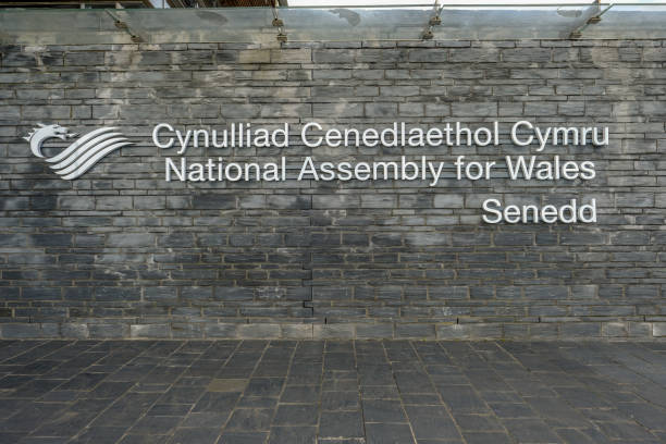 Cardiff Bay, Wales - May 20, 2017: National Assembly sign View of National Assembly signage, Senedd , in Welsh and English. national assembly for wales stock pictures, royalty-free photos & images