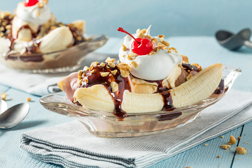 Sweet Homemade Banana Split Sundae with Chocolate Vanilla  Strawberry Ice Cream