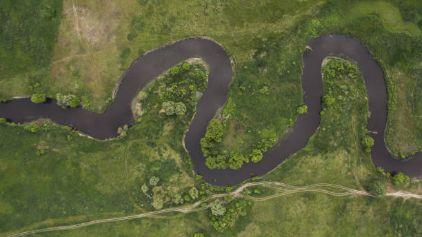 istock A beautiful narrow and winding river view from above. 701090662