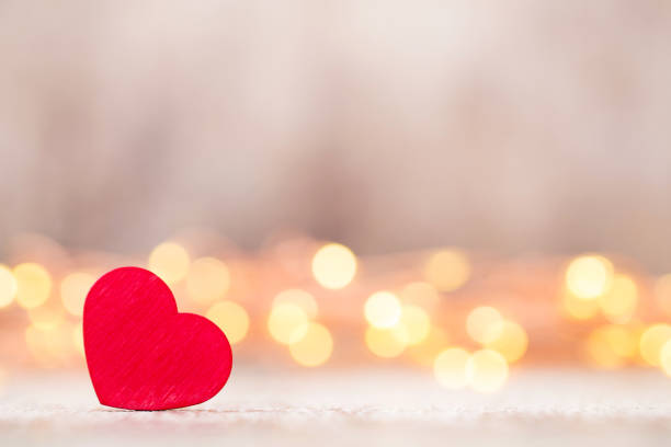 istock Red hearts on the wooden background. 701100964