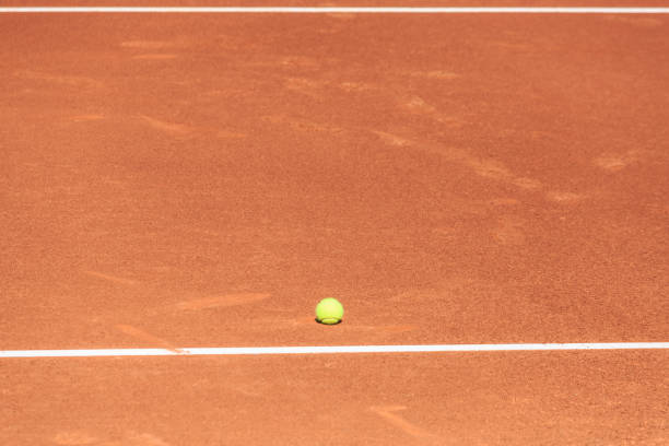 istock Tennis court and ball 701101174