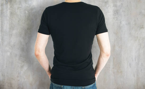 istock Casual man in black shirt back 701103458