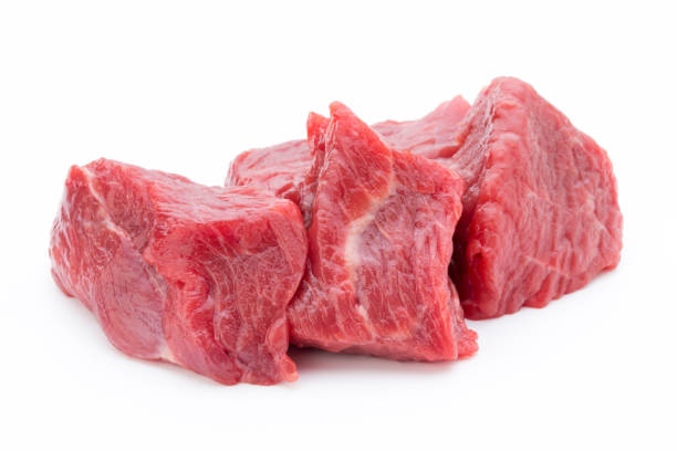 istock fresh meat on slice on the white background. 701103480