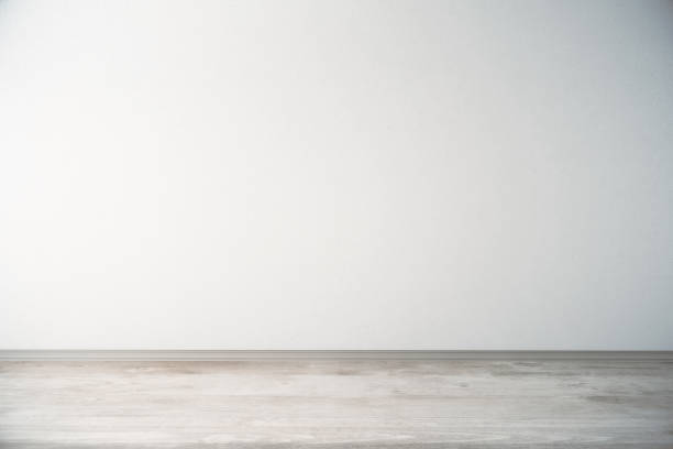istock Room with light wall and wooden floor 701112416