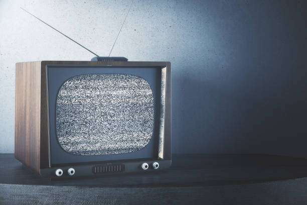 istock Retro TV on concrete background 701117386