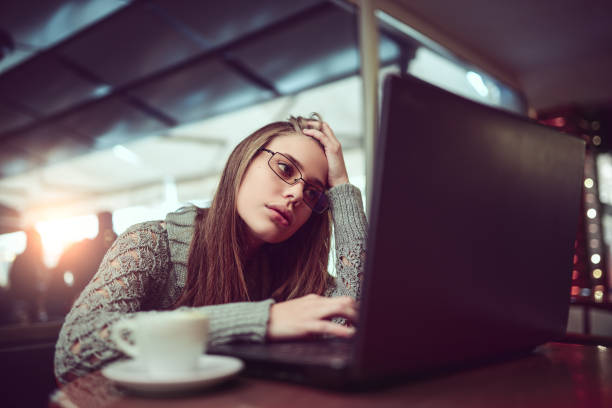 istock Tired Female Freelancer Working at her Favorite Coffee Place 701117674