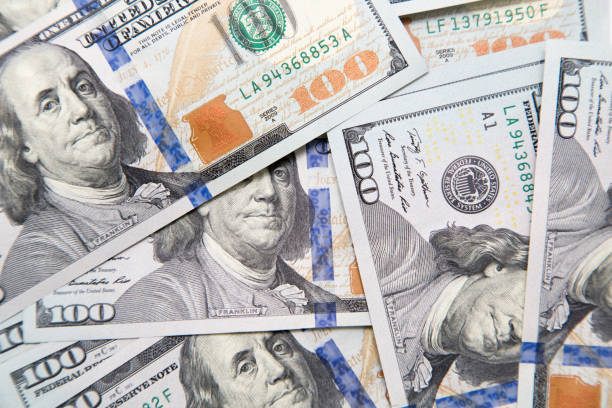 istock background made of hundred dollar banknotes 701117702