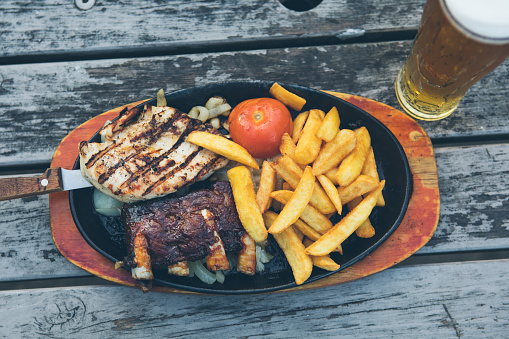Sizzling Steak, French Fries, Rib, Barbecue, Barbecue Grill on wooden plate