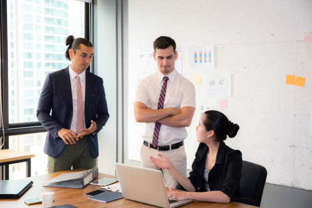 istock Business team having using laptop during a meeting and presents. 701141096