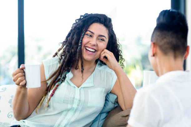 istock Lesbian couple having a cup of coffee 701193828
