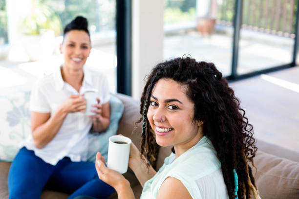 istock Lesbian couple having a cup of coffee 701195664