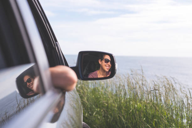 istock Group of friends inside car at viewpoint off Oregon Coast 701198360