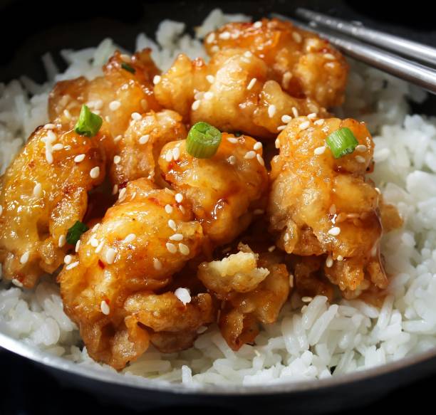 istock Honey Sesame Chicken served with Jasmin rice 701208774