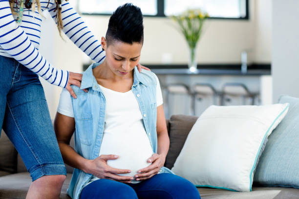 istock Woman with her pregnant partner 701211726