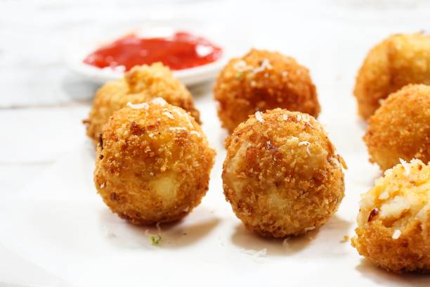 istock Mashed Potato Cheese balls / Croquette - Bread crumbed fried food roll 701216706