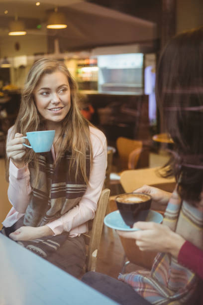 istock Woman drinking a cup of coffee 701219582
