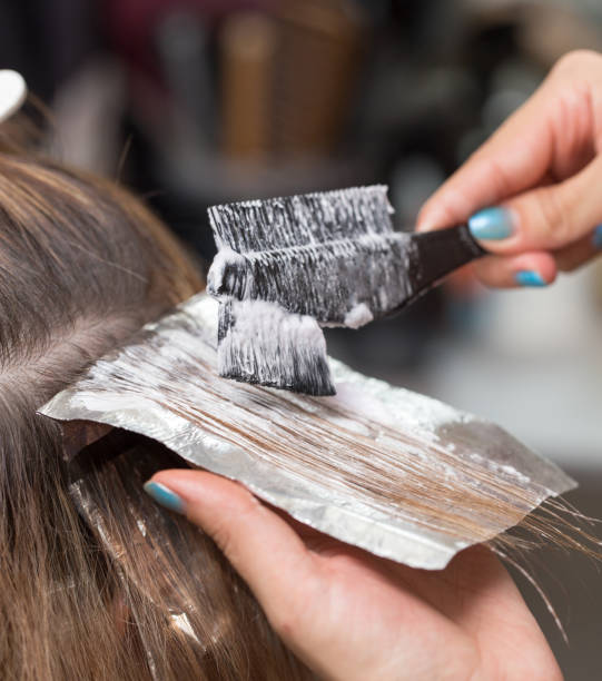 istock weave hair in a beauty salon 701220194