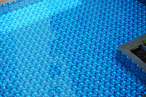 istock Background of rippled water in swimming pool 701222406