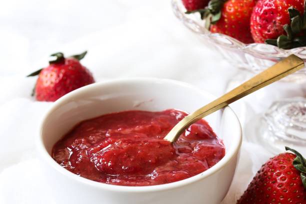 istock Homemade Strawberry Sauce served in a bowl, selective focus 701222464