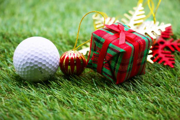 istock Golf ball with Christmas ornament 701246788