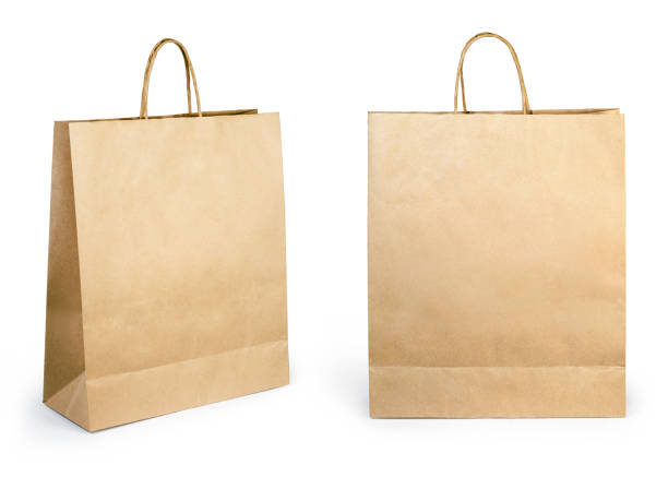 blank brown paper bag isolated on white background - paper bag fotos imagens e fotografias de stock