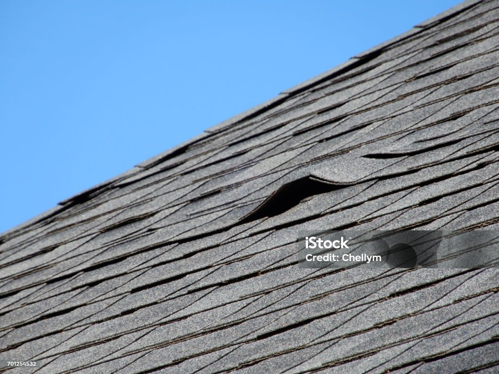 Damaged Roof Shingle old roofing shingles Wood Shingle Stock Photo