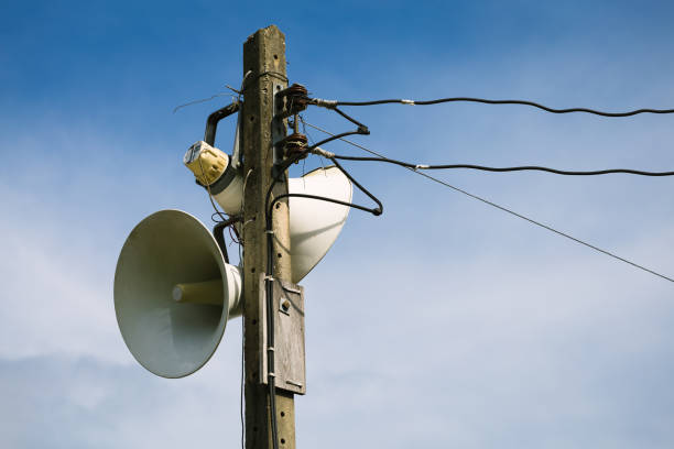 istock Low Angle View Of Megaphones Against Sky 702604337