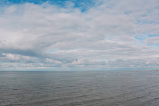 istock Scenic View Of Sea Against Cloudy Sky 705173677