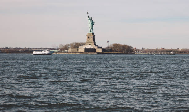 istock Statue Of Liberty By Upper Bay Against Sky 705176861
