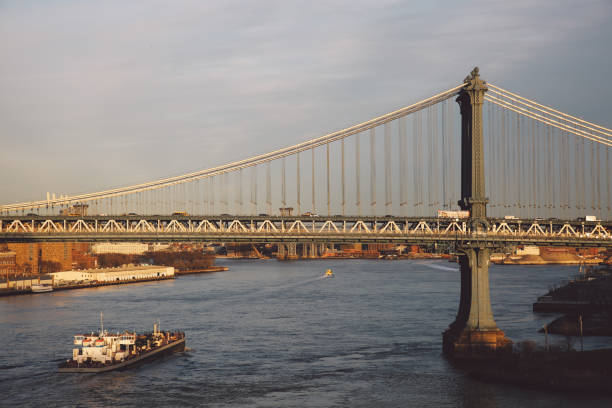 istock Brooklyn Bridge Over East River Against Sky 705178275