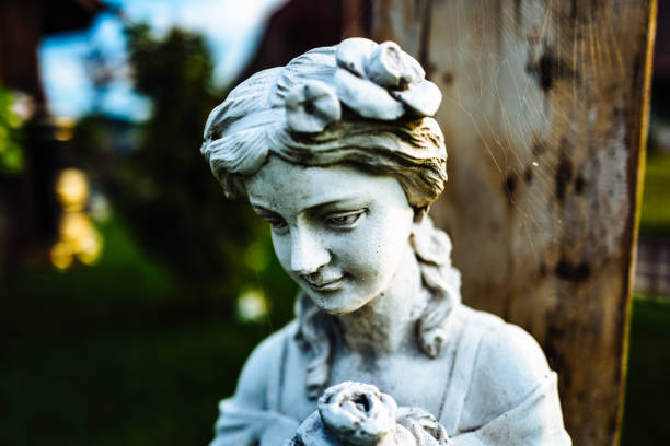 stone sculpture in a fountain of woman