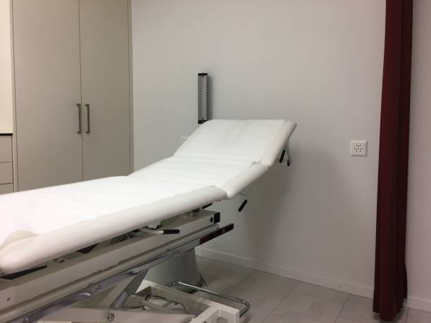 istock White Bed By Wall In Hospital 705199295