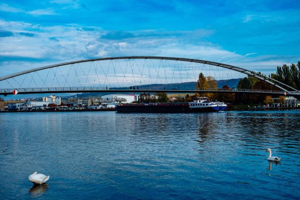 istock View Of Bridge Over River Against Cloudy Sky 705302435