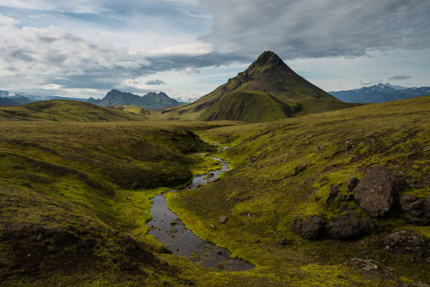 istock Scenic View Of Mountains Against Cloudy Sky 705315929