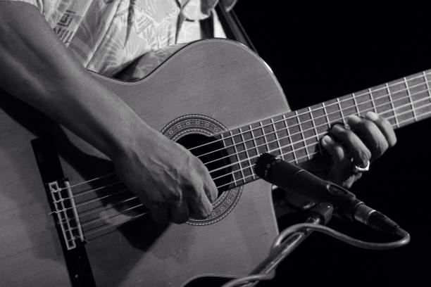 istock Midsection Of Man Playing Guitar 707499285