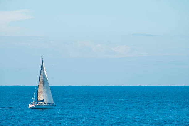 istock Sailboat Sailing On Blue Sea Against Sky 707542035