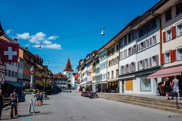 istock People On Street Against Blue Sky At Sempach 707551477
