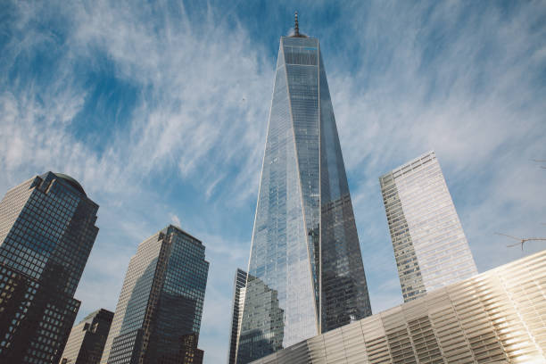 istock Low Angle View Of Skyscrapers Against Cloudy Sky 707562145